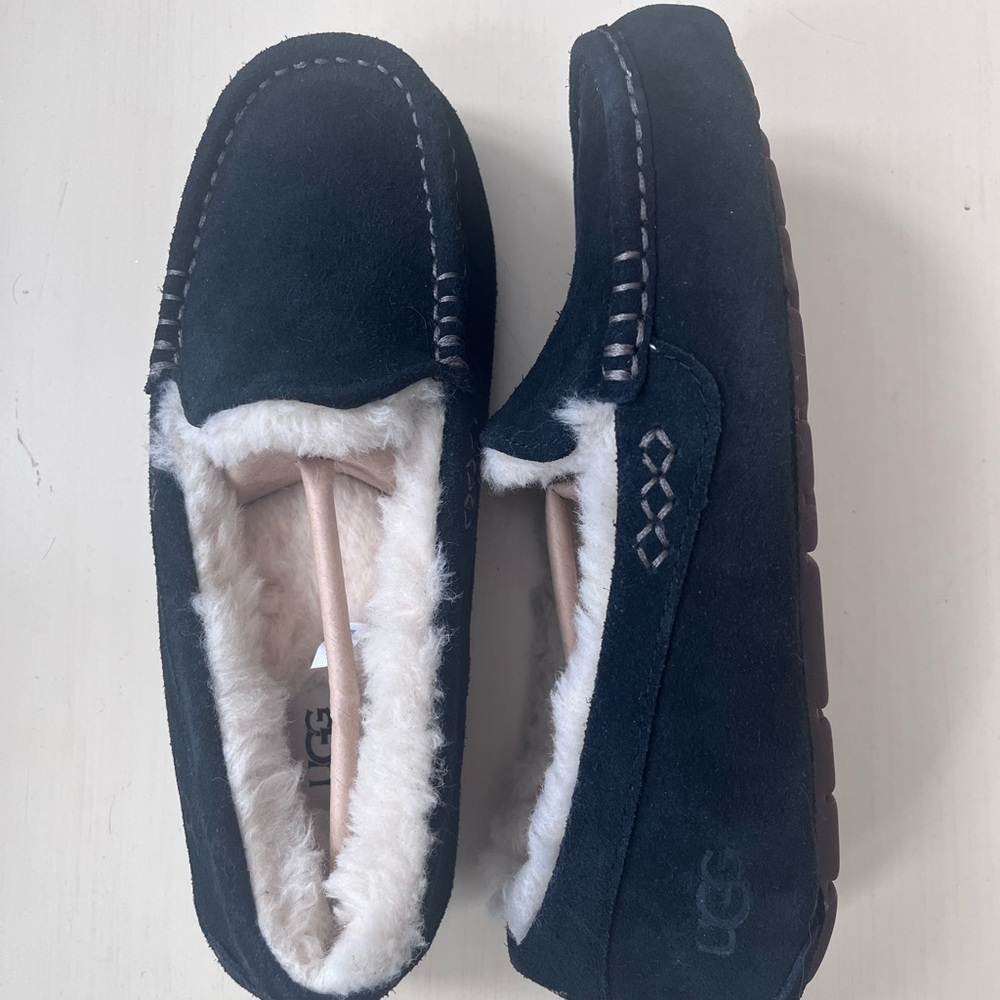 UGG |  Women's Black Moccasins with Cream Lining
